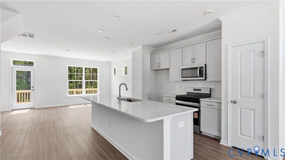 This photo shows a similar floorplan and quality level to Eastwood Homes. Actual design selections and layout may vary.