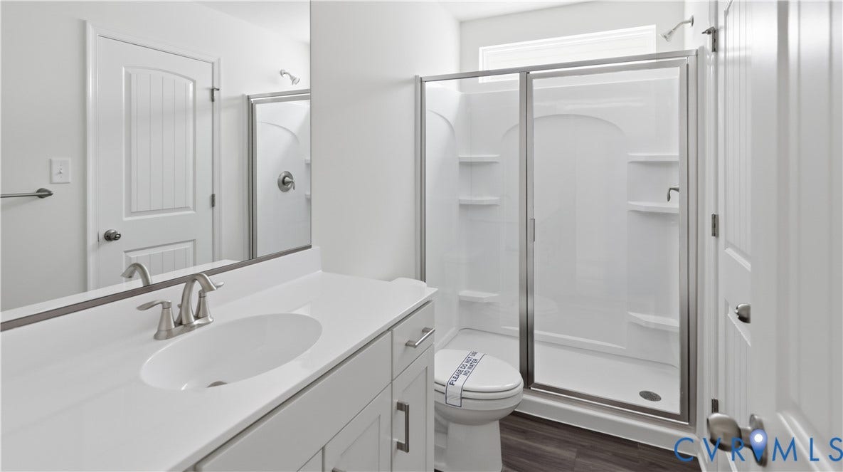 This photo shows a similar floorplan and quality level to Eastwood Homes. Actual design selections and layout may vary.