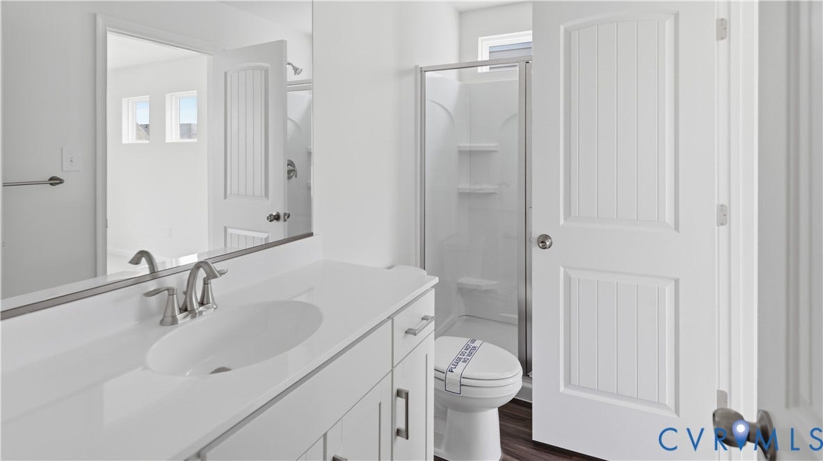 This photo shows a similar floorplan and quality level to Eastwood Homes. Actual design selections and layout may vary.