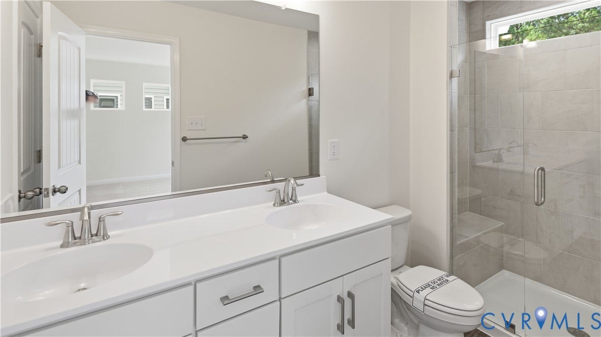 This photo shows a similar floorplan and quality level to Eastwood Homes. Actual design selections and layout may vary.