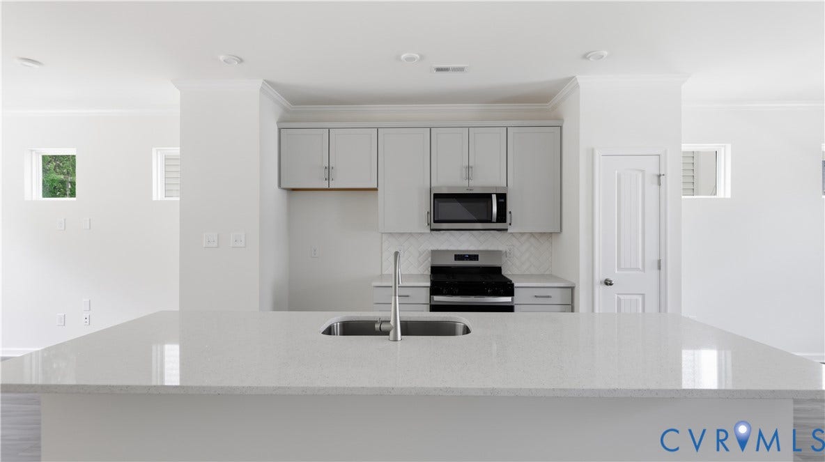 This photo shows a similar floorplan and quality level to Eastwood Homes. Actual design selections and layout may vary.