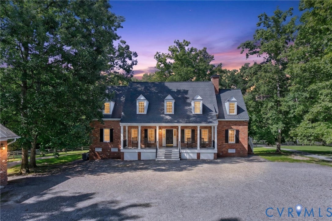 1108 Shallow Well Road, Manakin Sabot, VA 23103 Brick exterior with a prominent front porch, multiple dormer windows, and a dark-toned roof