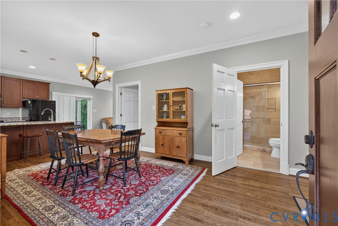 1108 Shallow Well Road, Manakin Sabot, VA 23103 Hardwood-finish flooring, crown molding, and a kitchen featuring wood cabinetry and granite-style countertops