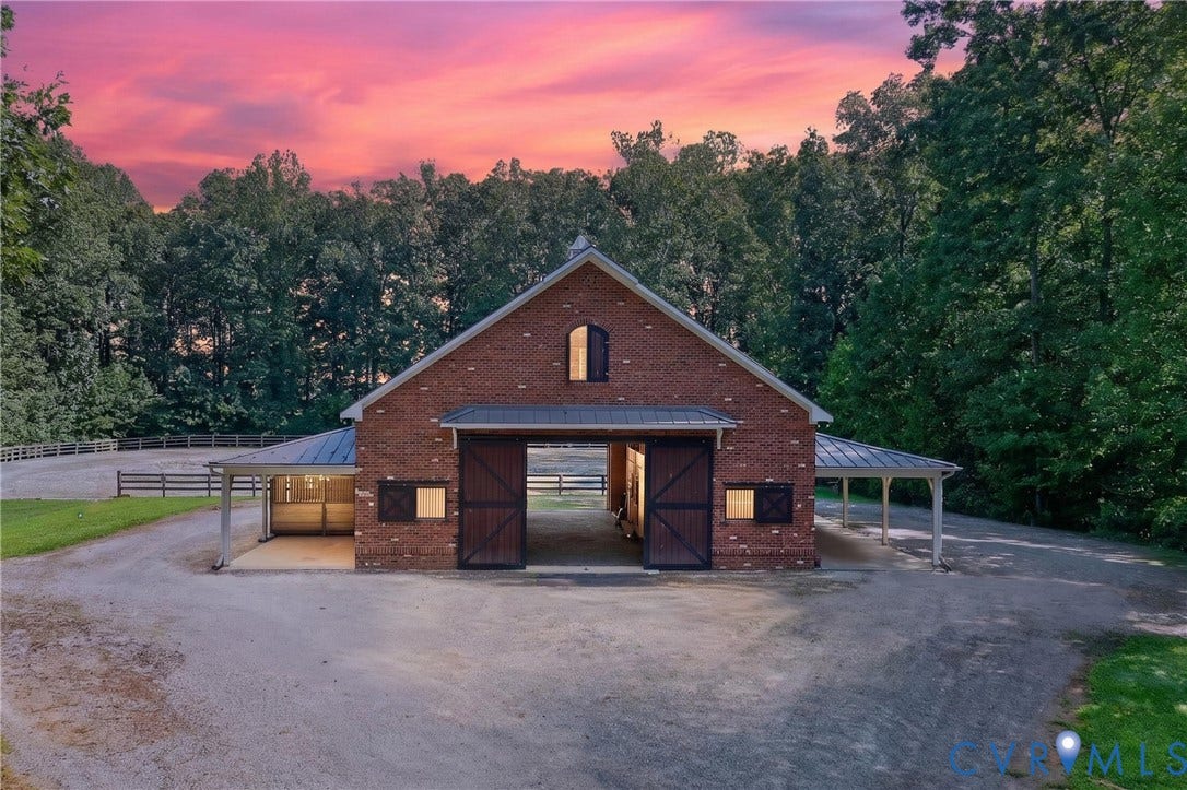 1108 Shallow Well Road, Manakin Sabot, VA 23103 Brick exterior barn with a gabled roof and covered side awnings
