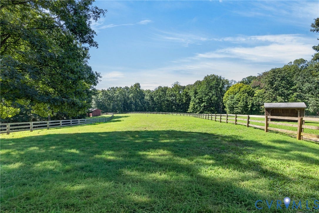 1108 Shallow Well Road, Manakin Sabot, VA 23103 Expansive grassy field with wood fencing and mature trees