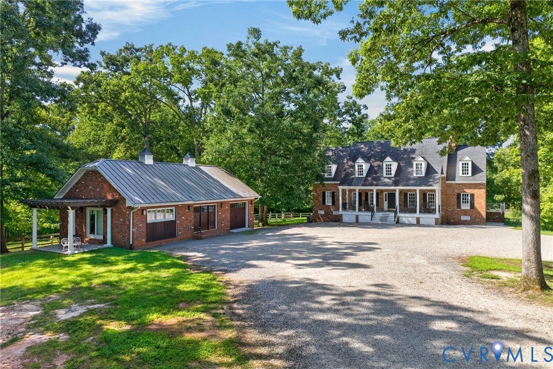 1108 Shallow Well Road, Manakin Sabot, VA 23103 Brick exterior main residence with a full-length covered front porch and dormer windows