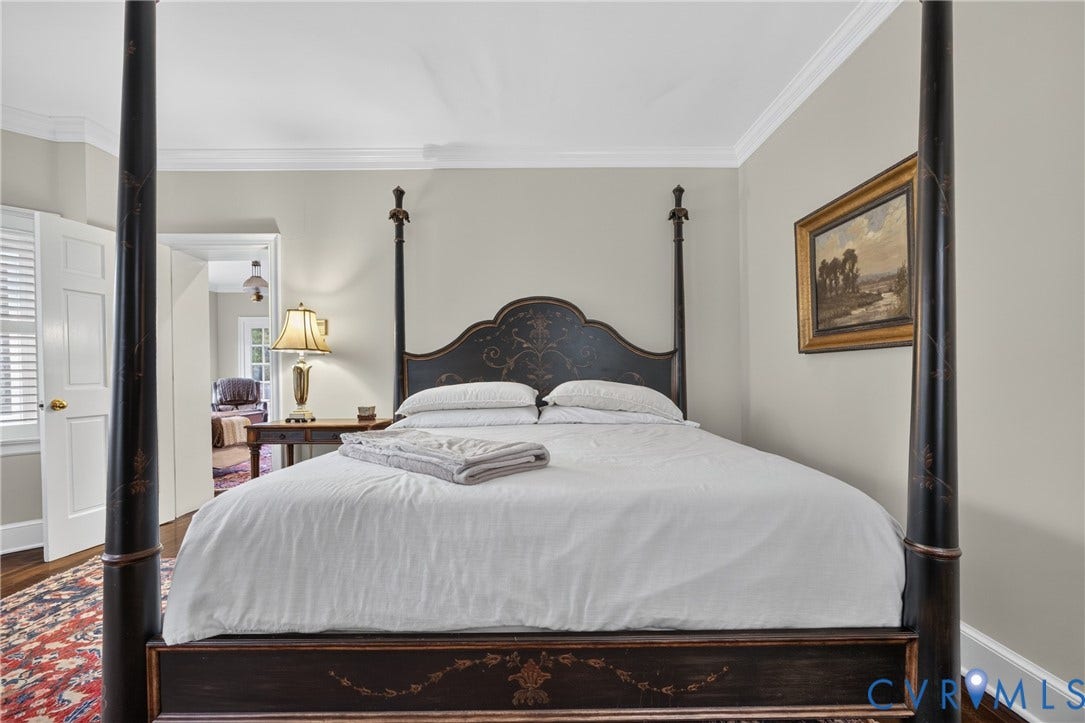 1108 Shallow Well Road, Manakin Sabot, VA 23103 Hardwood flooring, crown molding, cased doorways, and neutral wall tones