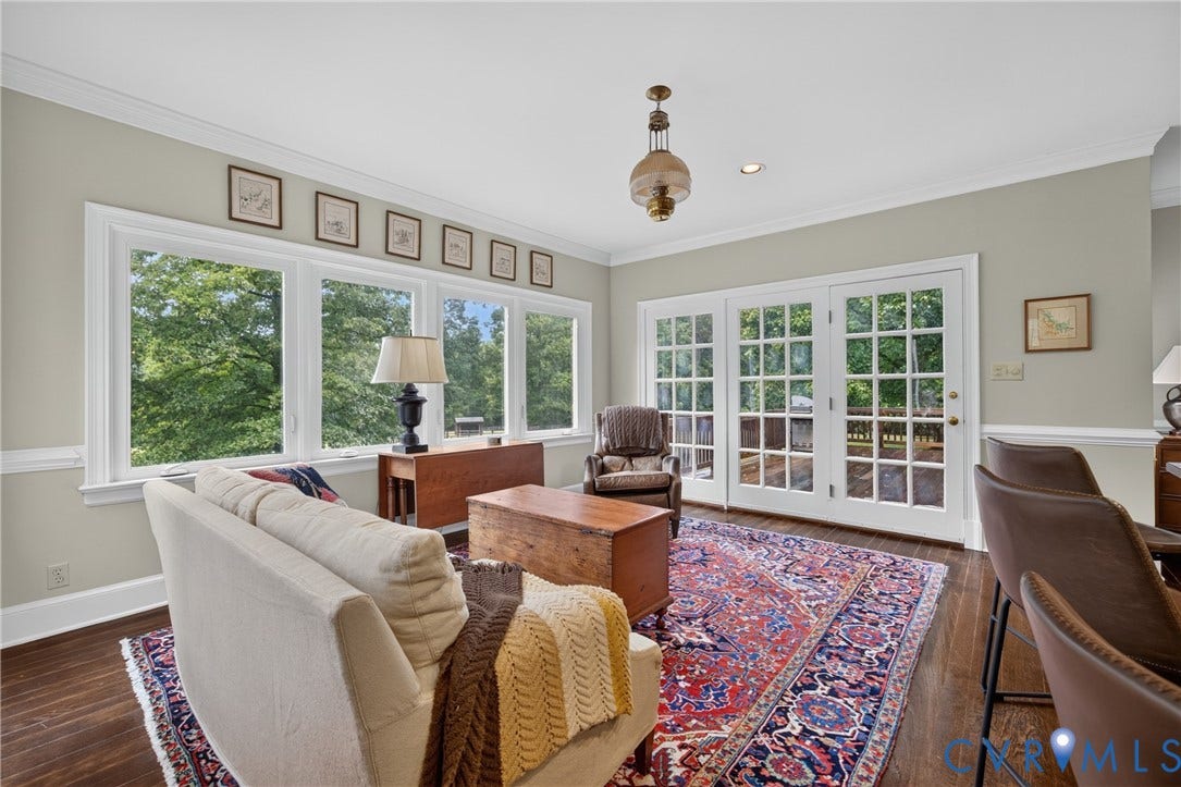 1108 Shallow Well Road, Manakin Sabot, VA 23103 Wood-finish flooring, white crown molding, recessed lighting, and white French doors