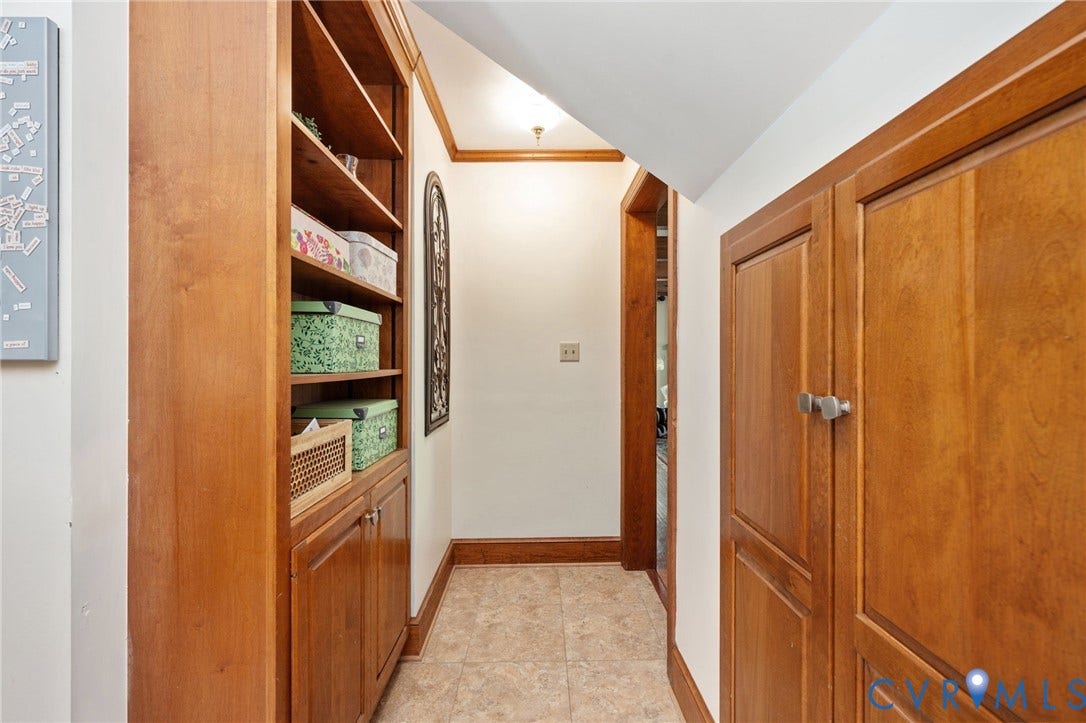 Built-in wood-finish shelving and cabinetry