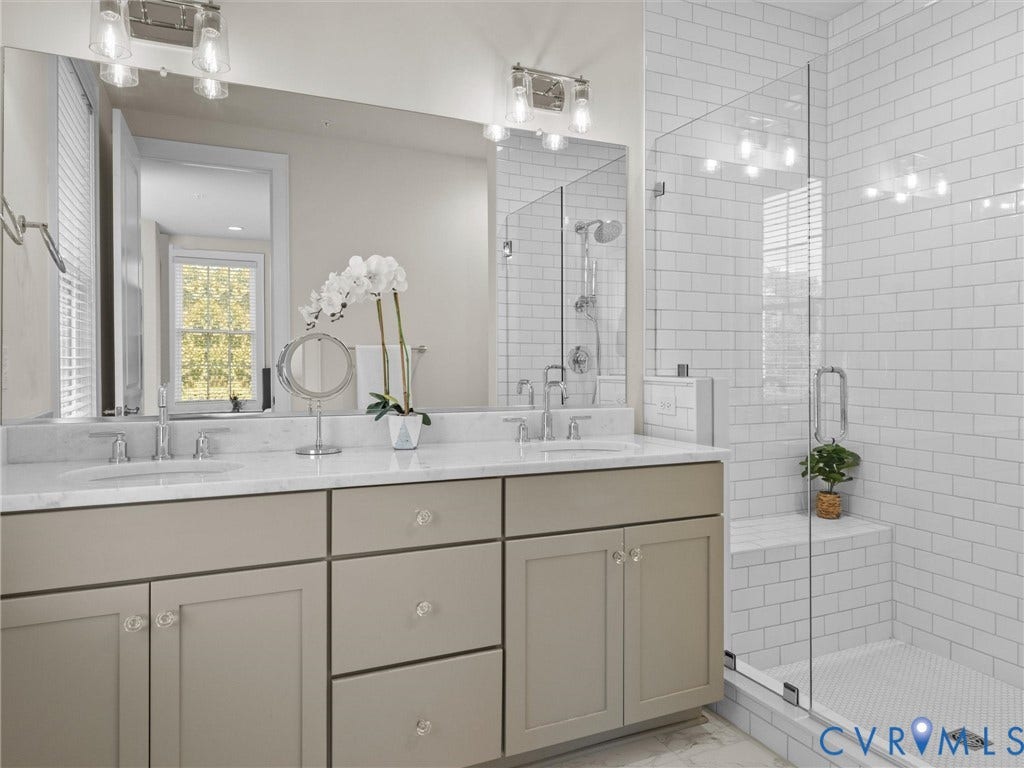 366 Souldren Walk, #A, Short Pump, Henrico, VA 23233 Dual vanity with stone countertop, frameless glass shower enclosure, subway tile shower walls, built-in shower bench, and tile flooring