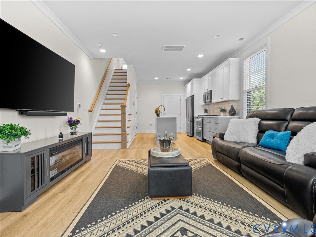 366 Souldren Walk, #A, Short Pump, Henrico, VA 23233 Open-concept living area featuring wood-finish flooring, recessed lighting, and crown molding