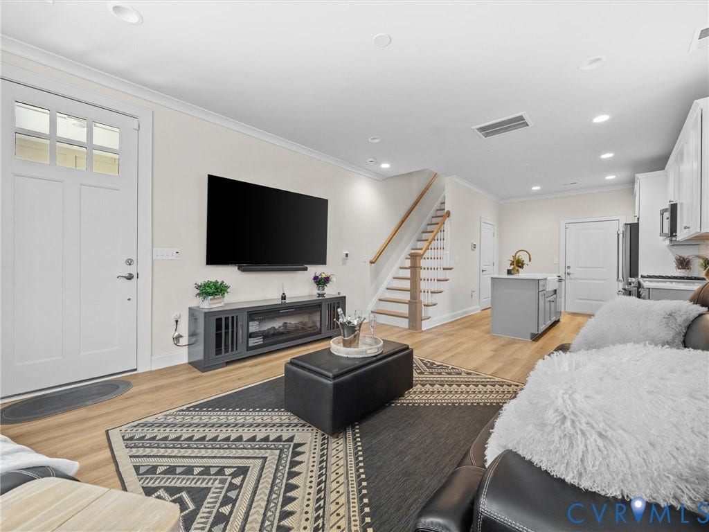 366 Souldren Walk, #A, Short Pump, Henrico, VA 23233 Wood-finish flooring, recessed lighting, and a staircase with wood handrails