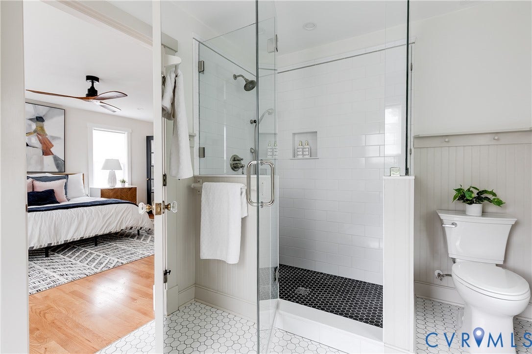 4015 Mount Vernon Street, Bellevue, Richmond, VA 23227 Glass-enclosed shower with subway tile surround and black hexagon tile flooring