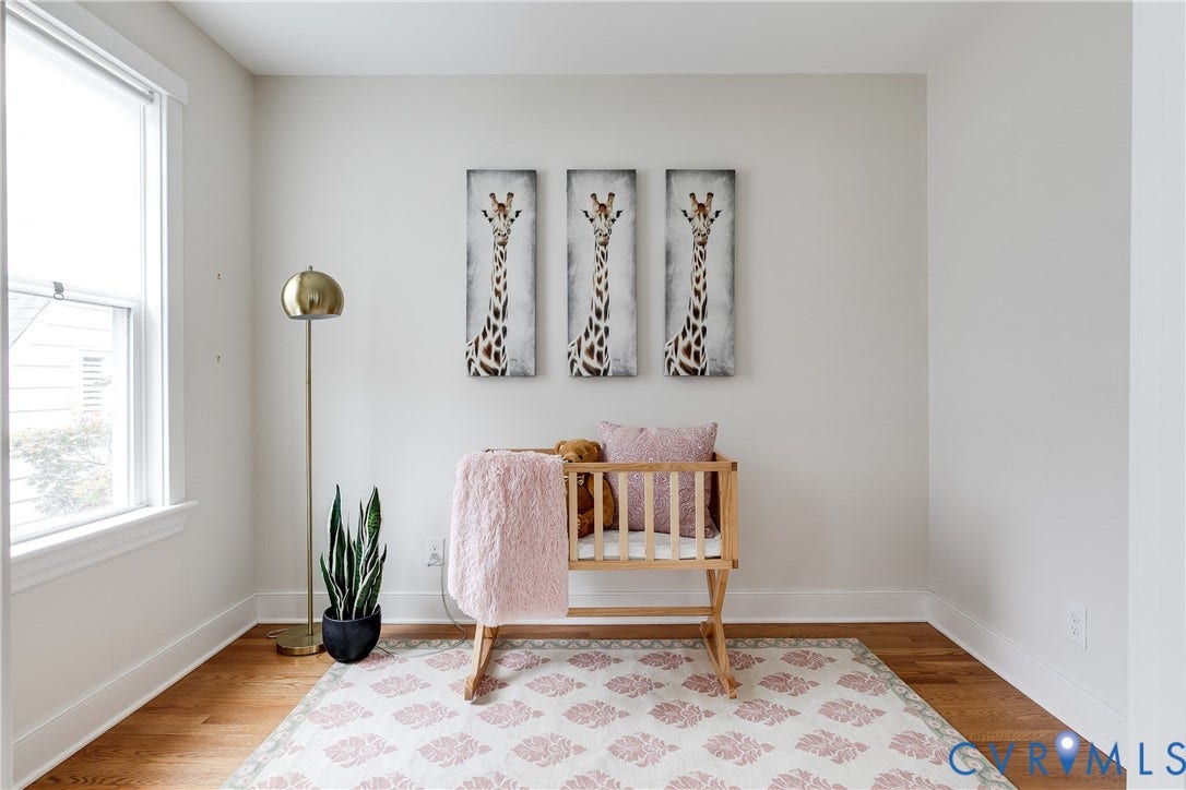 4015 Mount Vernon Street, Bellevue, Richmond, VA 23227 Hardwood flooring, painted walls, and a prominent window