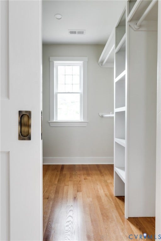 4015 Mount Vernon Street, Bellevue, Richmond, VA 23227 Recessed ceiling lighting, wood flooring, built-in shelving, and a window with grid pattern