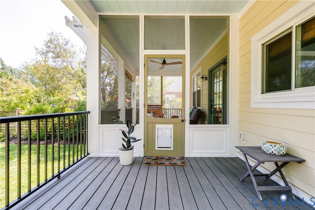 4015 Mount Vernon Street, Bellevue, Richmond, VA 23227 Expansive porch featuring composite decking, black metal railings, and a screened door with a built-in pet access panel