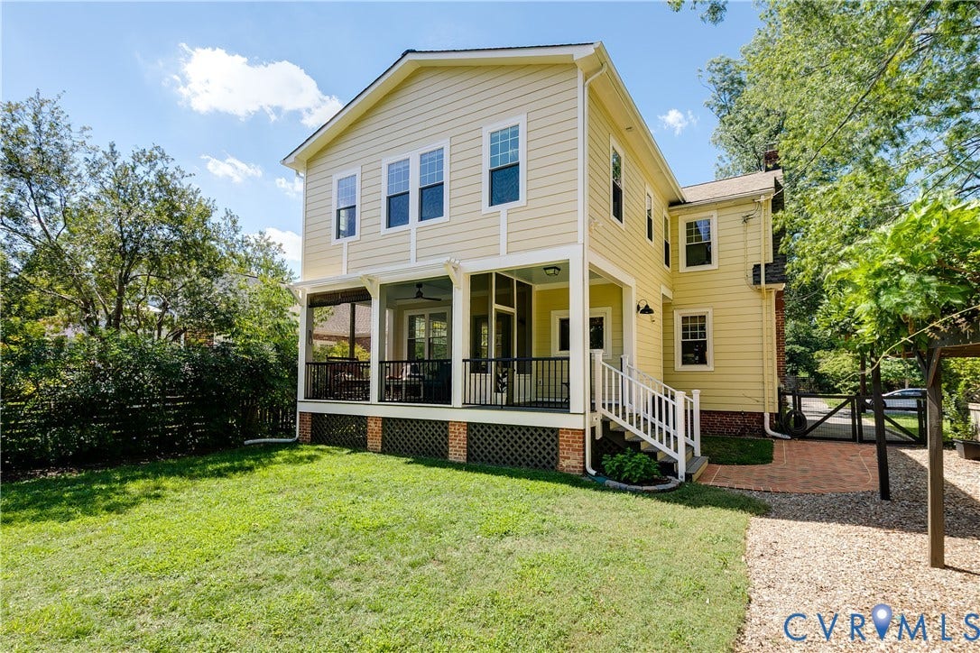 4015 Mount Vernon Street, Bellevue, Richmond, VA 23227 Yellow siding exterior with a screened porch and white railing, brick foundation, and a gravel pathway
