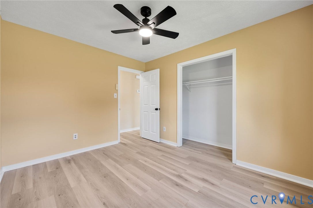 4411 Samara Drive, Henrico, VA 23231 Wood-finish flooring, light-toned walls, and a ceiling fan with integrated lighting