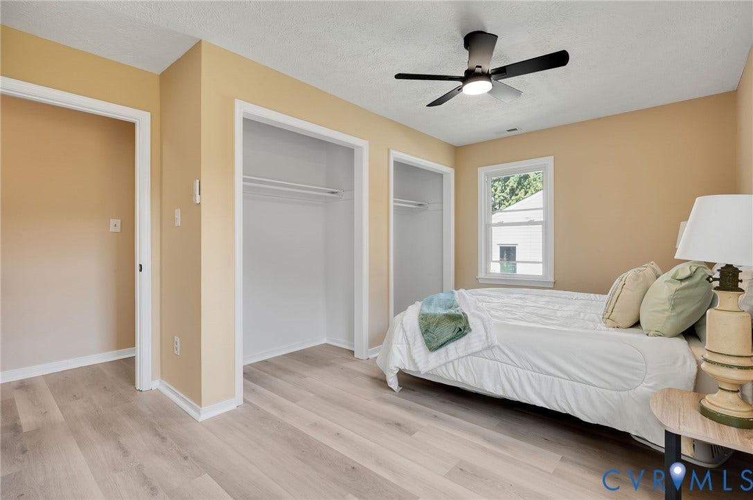 4411 Samara Drive, Henrico, VA 23231 Light wood-finish flooring, recessed closets, ceiling fan with integrated lighting, and a white-framed window