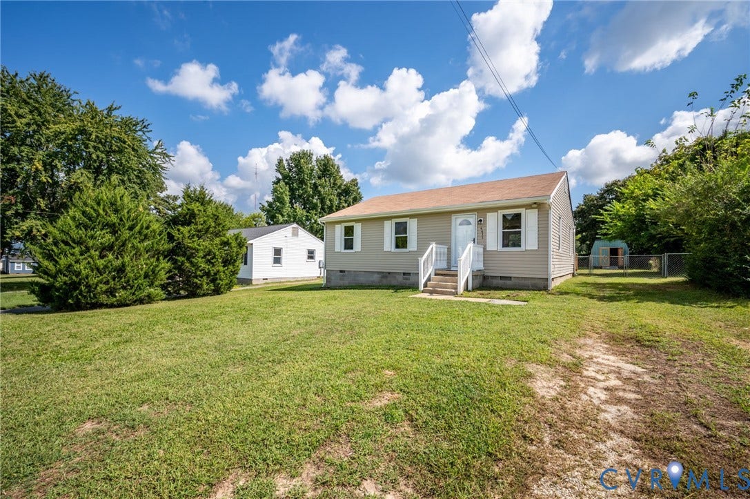 4411 Samara Drive, Henrico, VA 23231 Single-story residence featuring light-colored siding and a contrasting roof