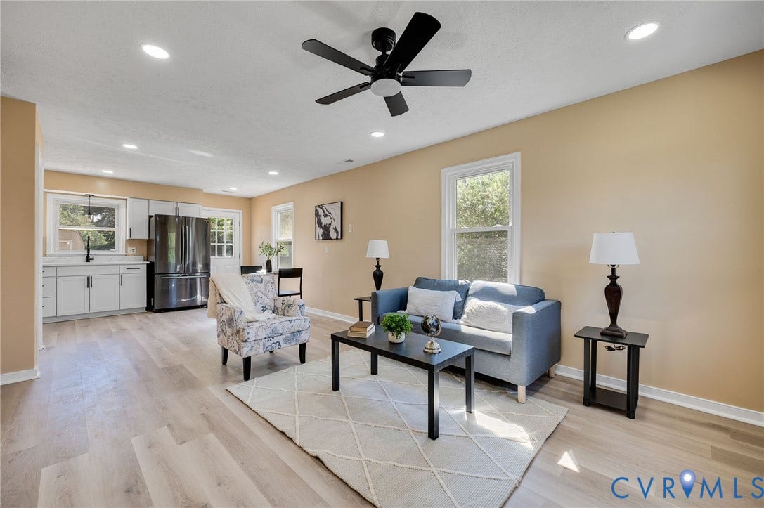 4411 Samara Drive, Henrico, VA 23231 Light wood-finish flooring throughout, recessed lighting, and a ceiling fan with integrated lighting