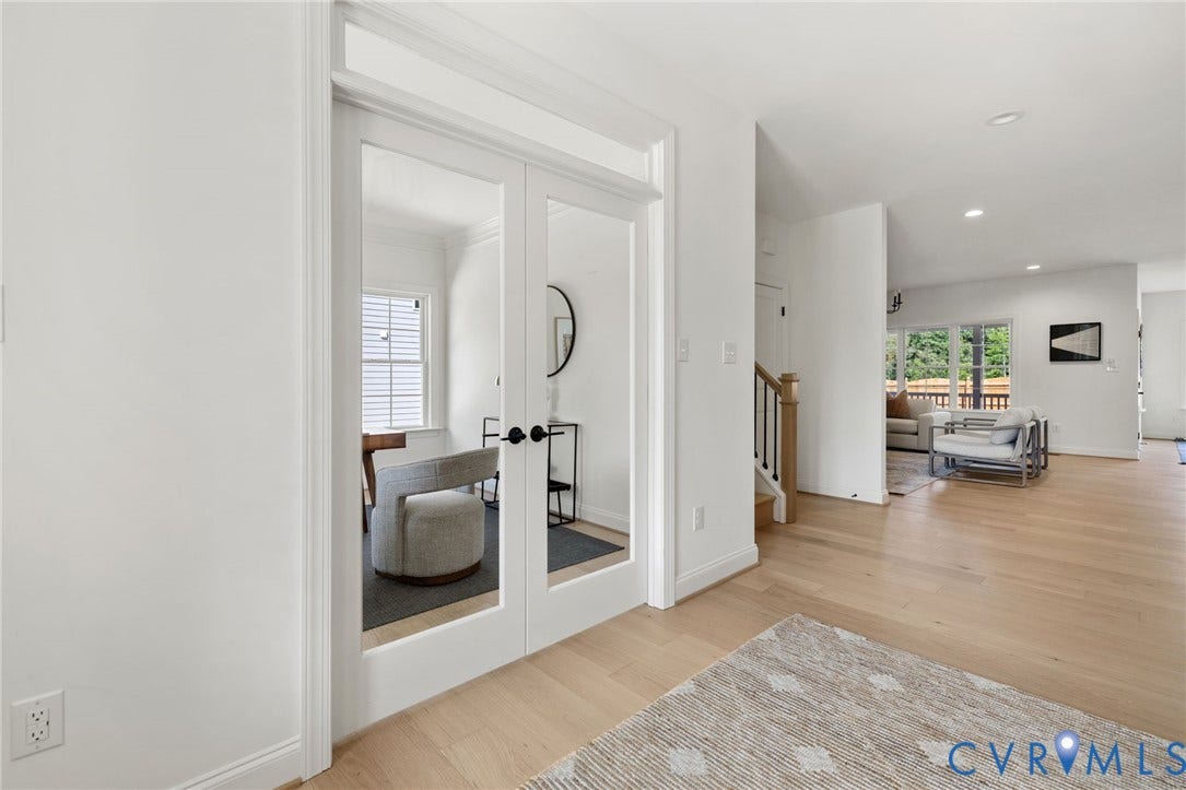 2871 Old Pump Road, The Preserve At John Rolfe, Henrico, VA 23233 Glass-paneled double doors, light wood-finish flooring, recessed lighting, and a staircase with wood newel post and wrought iron balusters