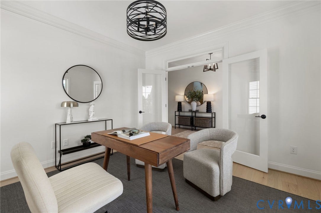 2871 Old Pump Road, The Preserve At John Rolfe, Henrico, VA 23233 White walls with crown molding, wood-finish flooring, a contemporary black metal chandelier, and a pair of white French doors with frosted glass panels