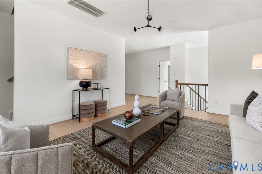 2871 Old Pump Road, The Preserve At John Rolfe, Henrico, VA 23233 Recessed lighting, wood-finish flooring, white walls, black metal spindle railing, and a contemporary ceiling fixture