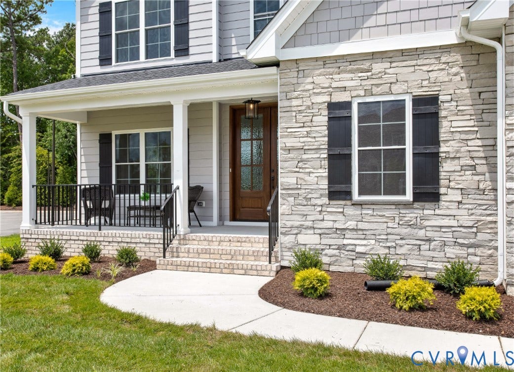 2871 Old Pump Road, The Preserve At John Rolfe, Henrico, VA 23233 Stone veneer facade with black louvered shutters and a covered front porch featuring white columns