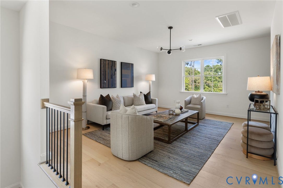2871 Old Pump Road, The Preserve At John Rolfe, Henrico, VA 23233 Light-toned wood-finish flooring complements the neutral wall palette
