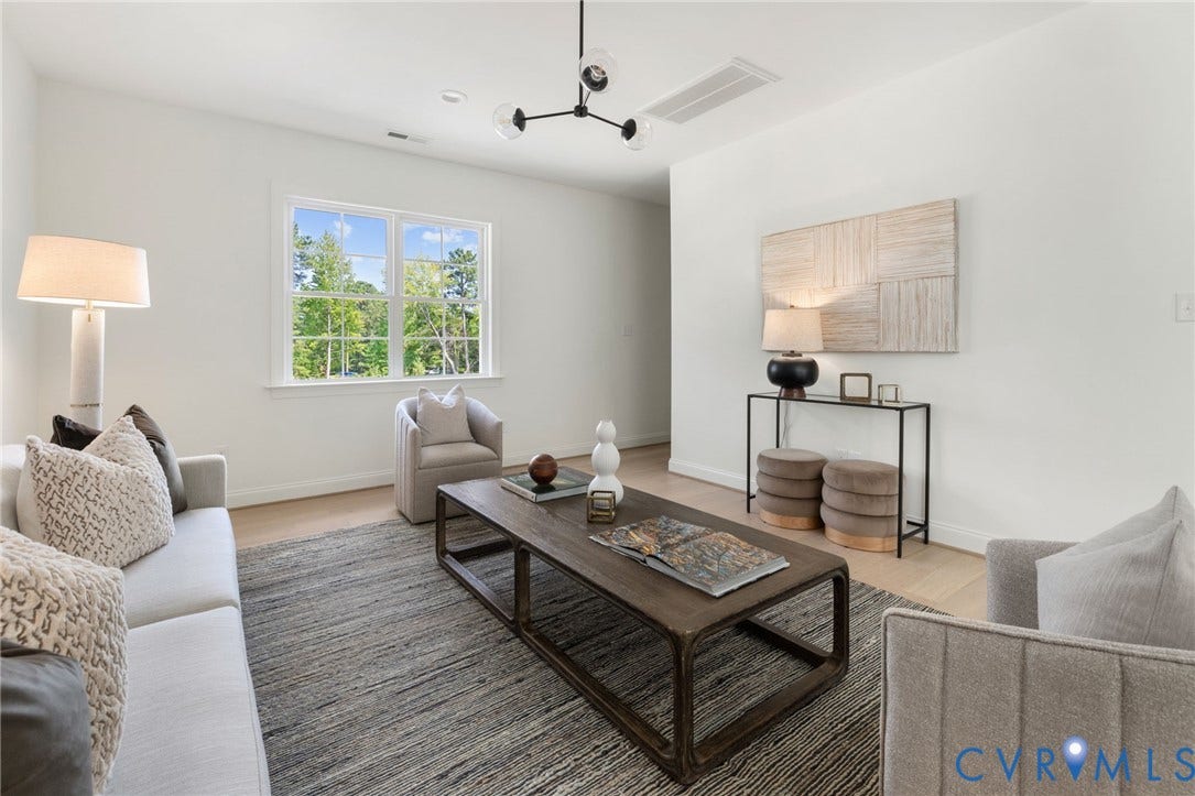 2871 Old Pump Road, The Preserve At John Rolfe, Henrico, VA 23233 Hardwood-style flooring, white walls, large window with white trim, recessed lighting, and a contemporary chandelier