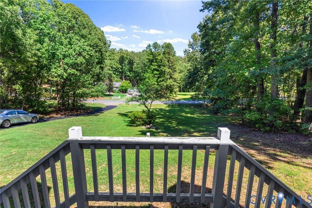 2137 Scarlet Mill Lane, Powhatan, VA 23139 Expansive outdoor area featuring a lush green lawn and mature trees