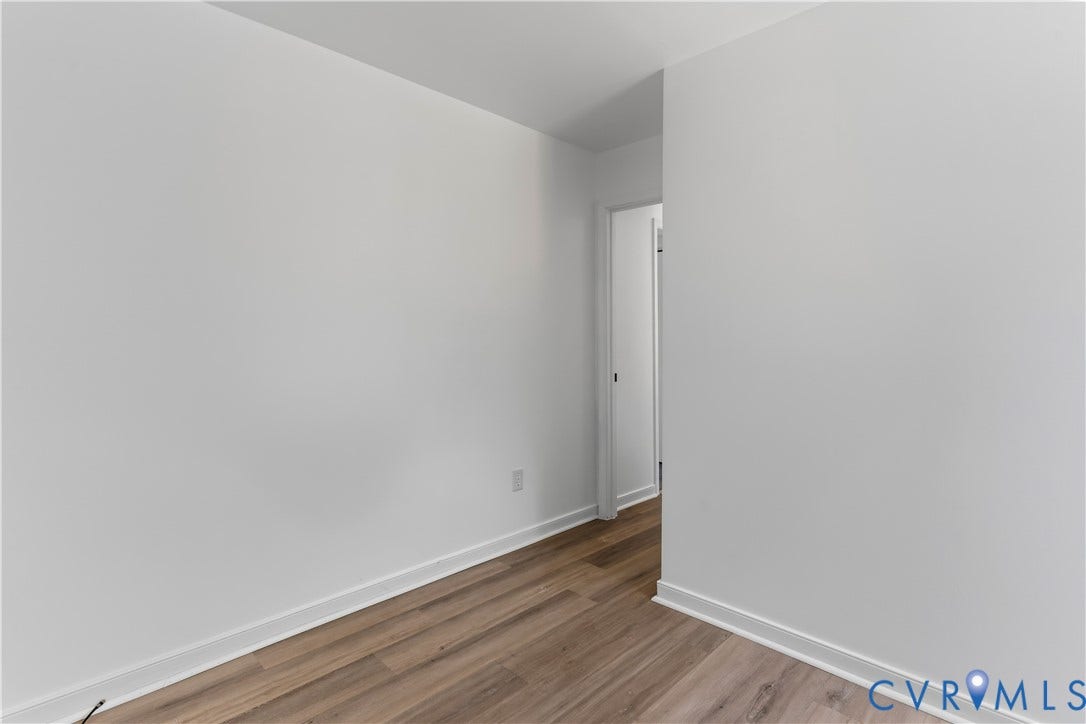 952 Pleasant Street, Henrico, VA 23223 Wood-finish flooring with white baseboards and light-toned walls