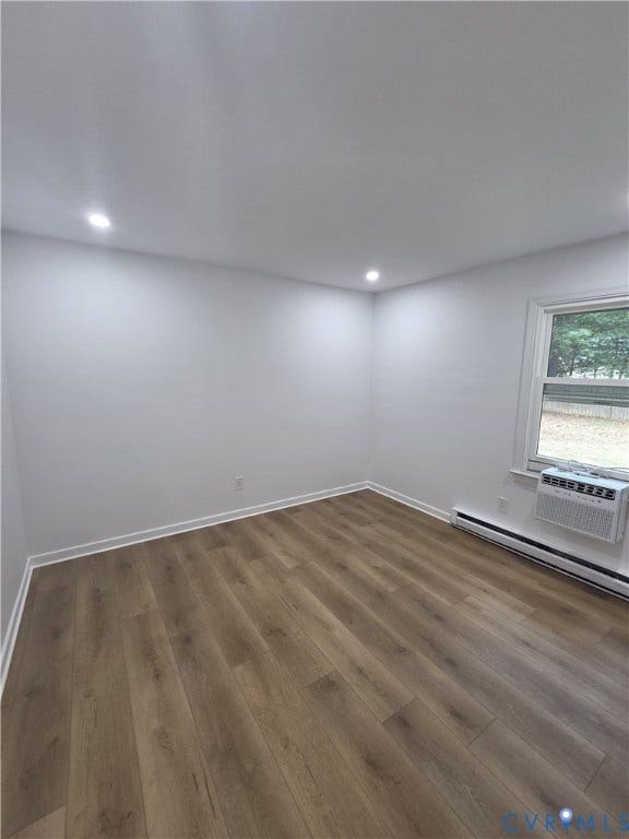 6004 Simplicity Court, Chesterfield, VA 23832 1st bedroom, 1st floor. Recessed lighting, wood-finish flooring, white walls, window, and baseboard heating