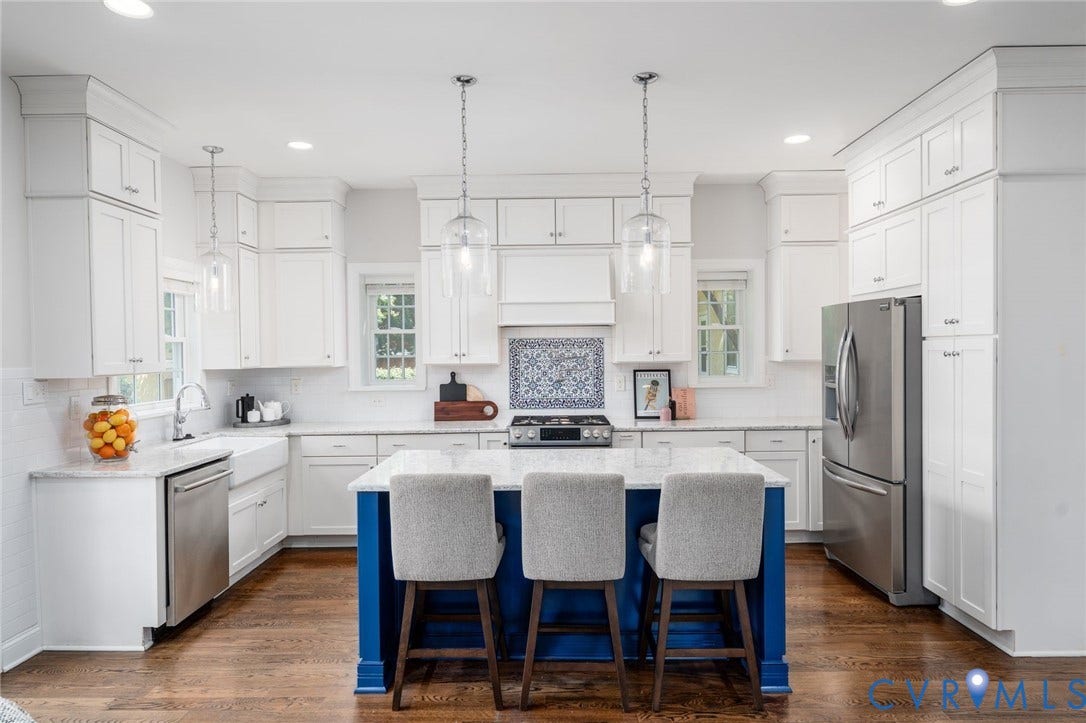 Eat-in kitchen flows onto back yard