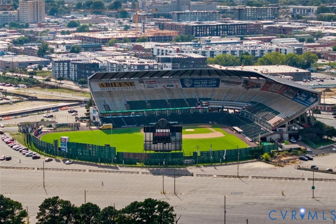 1316 Brookland Parkway, Richmond, VA 23227 Aerial perspective showcasing a baseball stadium with surrounding urban development