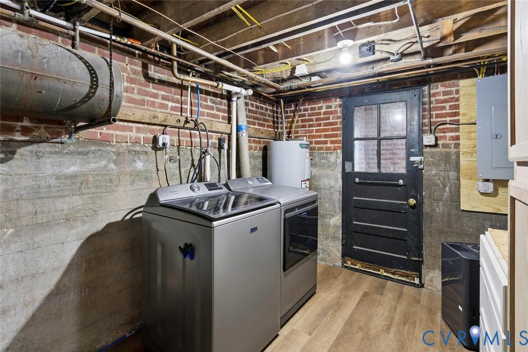1316 Brookland Parkway, Richmond, VA 23227 Basement space featuring exposed brick, concrete foundation walls, and wood-finish flooring