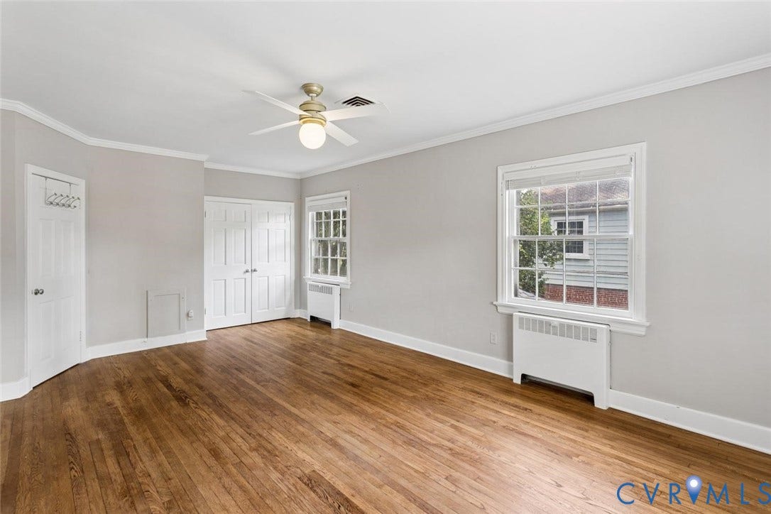 1316 Brookland Parkway, Richmond, VA 23227 Wood-finish flooring, ceiling fan, and multiple windows with trim