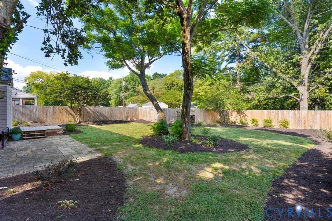 1316 Brookland Parkway, Richmond, VA 23227 Private fenced backyard featuring a paver patio and established trees