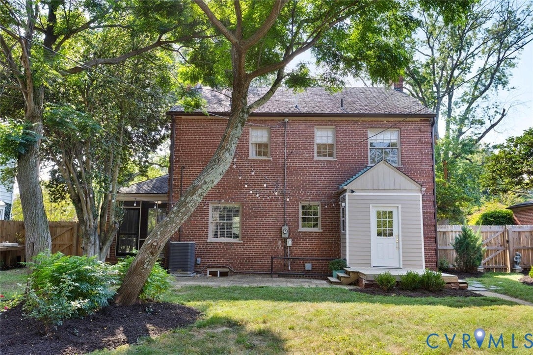 1316 Brookland Parkway, Richmond, VA 23227 Brick exterior featuring an attached screened porch, and a rear addition with a gabled roofline