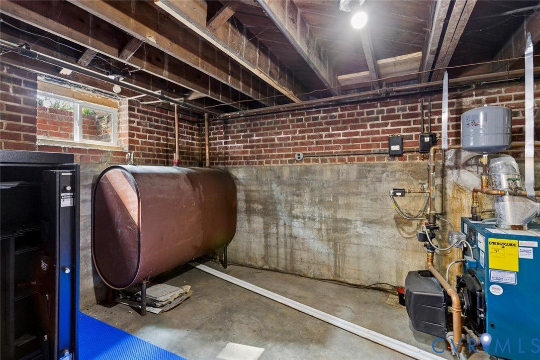 1316 Brookland Parkway, Richmond, VA 23227 Exposed ceiling joists, brick and concrete foundation walls, single window, and a heating system with an expansion tank