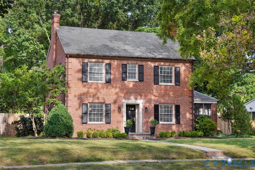 1316 Brookland Parkway, Richmond, VA 23227 Brick exterior with black shutters and a prominent chimney