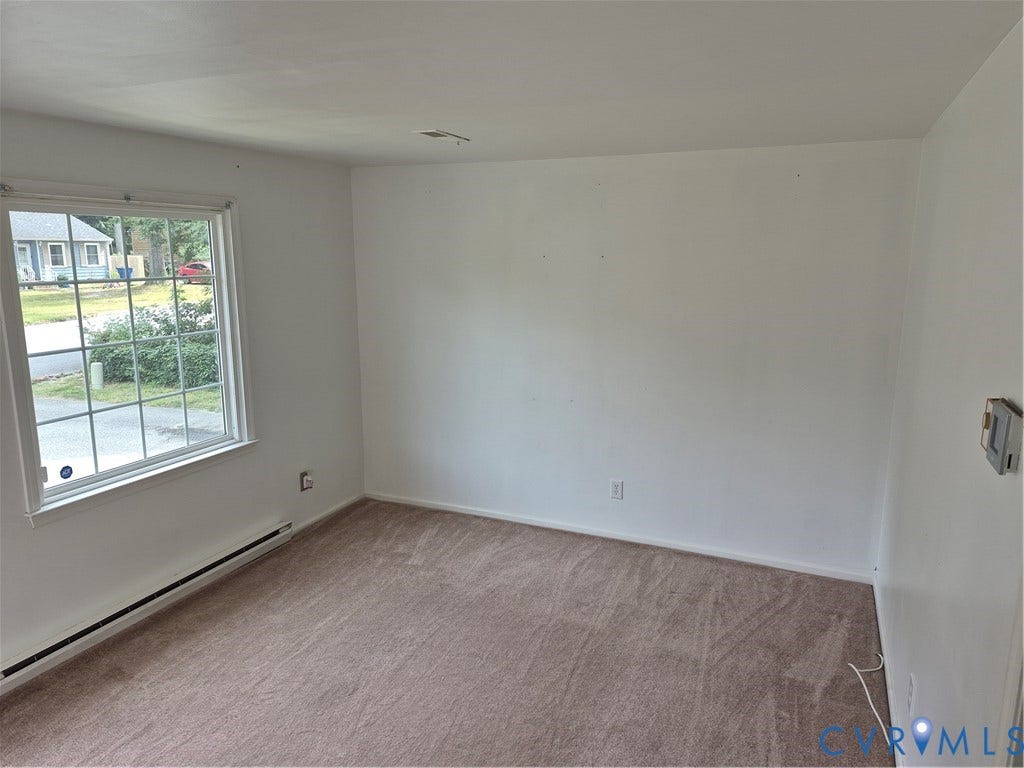 9324 Shiloh Drive, Chesterfield, VA 23237 Carpeted flooring, white walls, and a window with grid panes