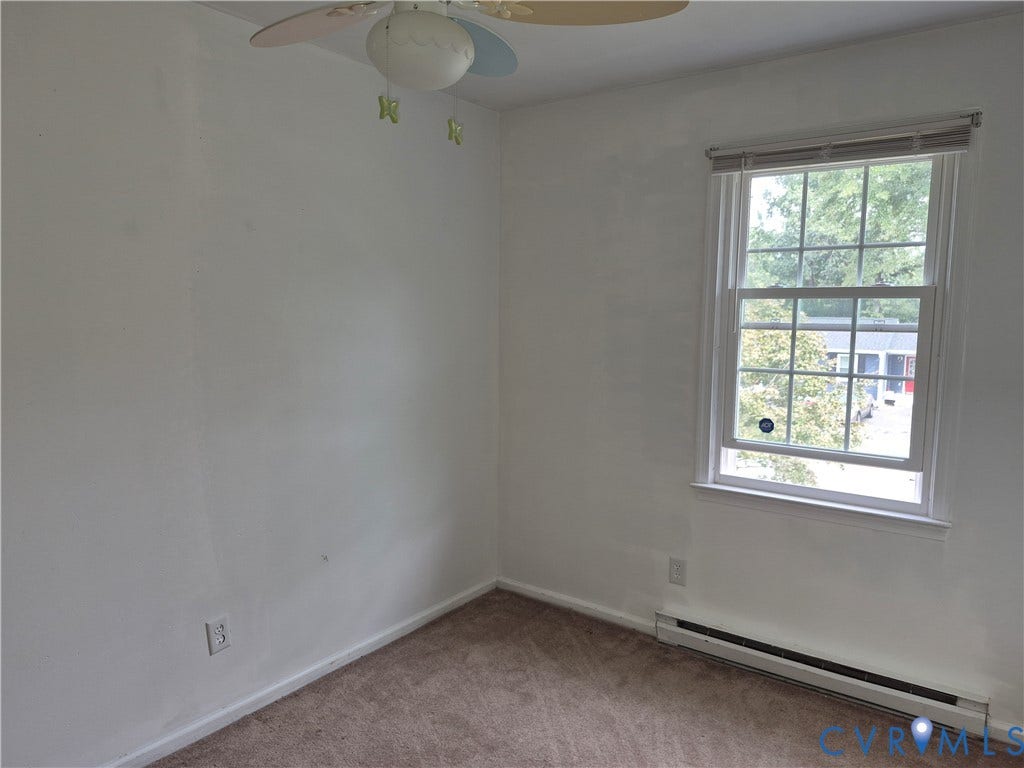 9324 Shiloh Drive, Chesterfield, VA 23237 Carpeted flooring, single pane window, window blind, and ceiling fan