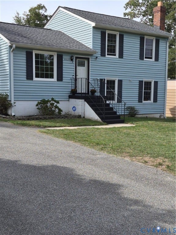9324 Shiloh Drive, Chesterfield, VA 23237 Blue siding exterior with contrasting dark shutters, dark roof, dark entry steps, and an asphalt driveway