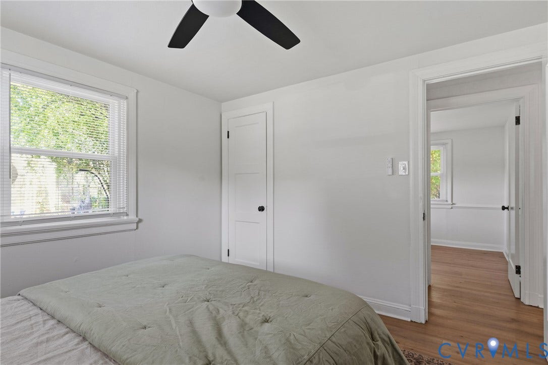 7406 Alycia Avenue, Henrico, VA 23228 White walls, a ceiling fan, and a light wood-finish flooring