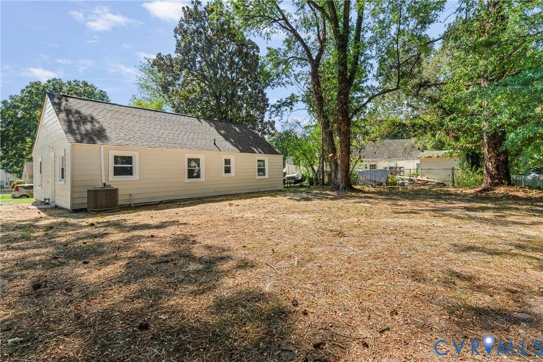 7406 Alycia Avenue, Henrico, VA 23228 Charming single-story home situated on an expansive lot with mature shade trees
