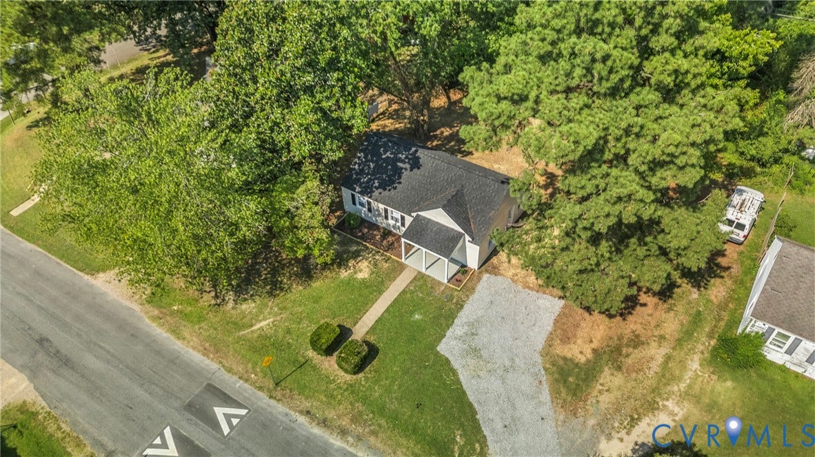 7406 Alycia Avenue, Henrico, VA 23228 Single-story property with a dark shingled roof and light-colored siding