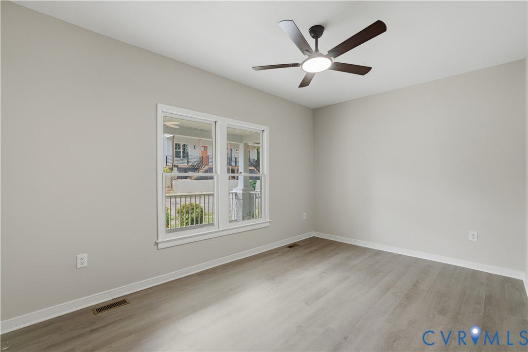 124 Lipscomb Street, Blackwell, Richmond, VA 23224 Recessed lighting, wood-finish flooring, and a contemporary ceiling fan with integrated lighting