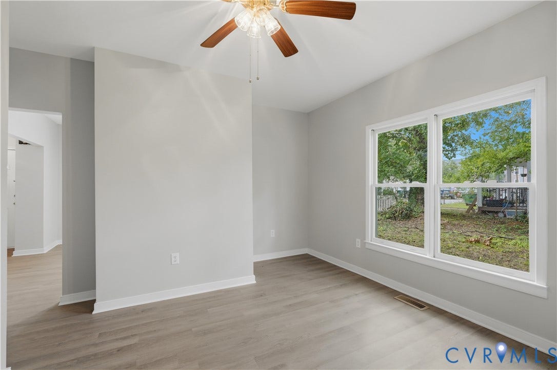 124 Lipscomb Street, Blackwell, Richmond, VA 23224 Neutral wall color with wood-finish flooring